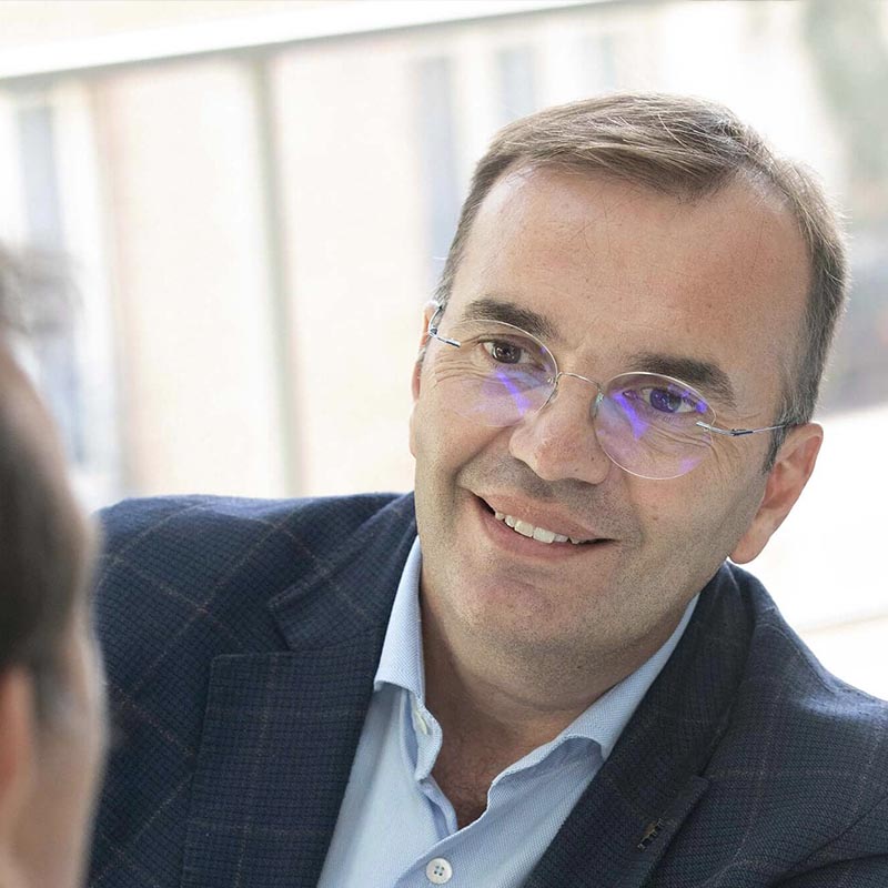 Eric, cofounder of Chocolat-e is smiling.