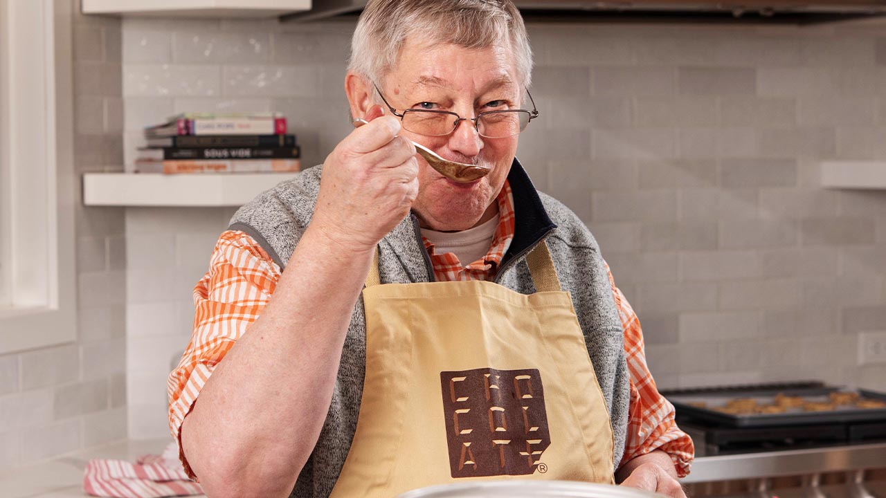 Norm is taste testing the chocolate sorbet and his facial expression says it's good!
